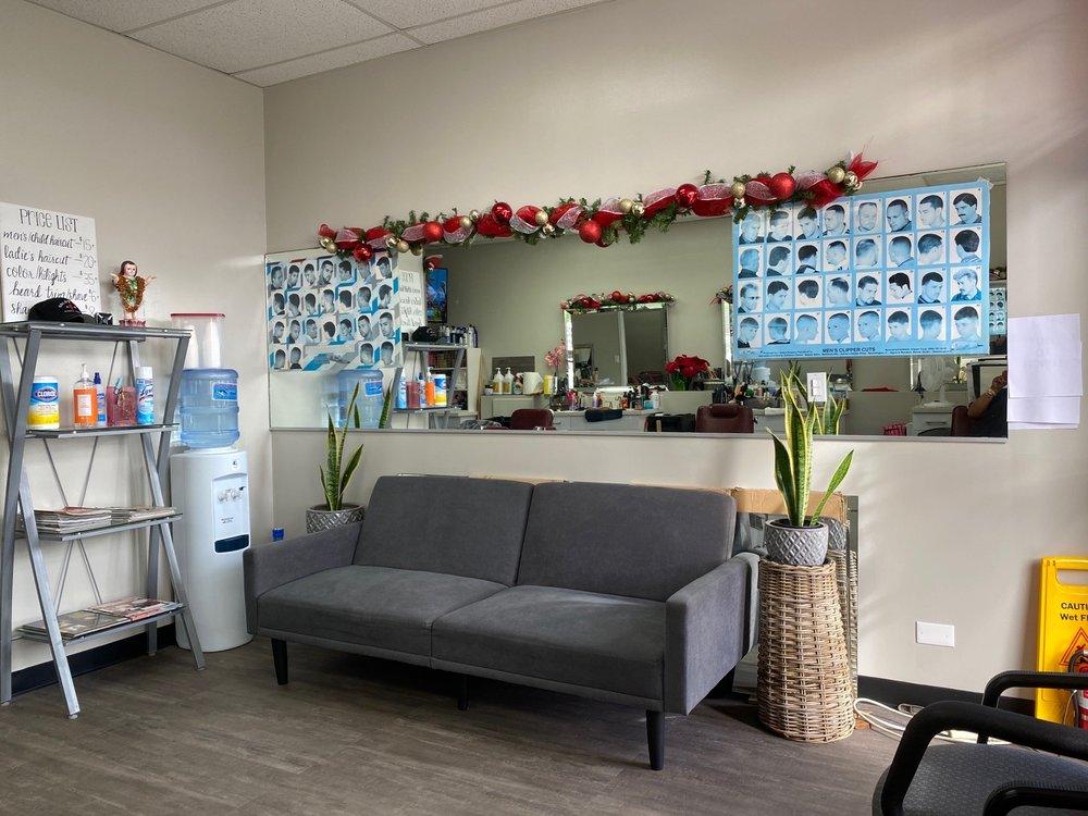 Inside Badua's: barber chairs and the price board
